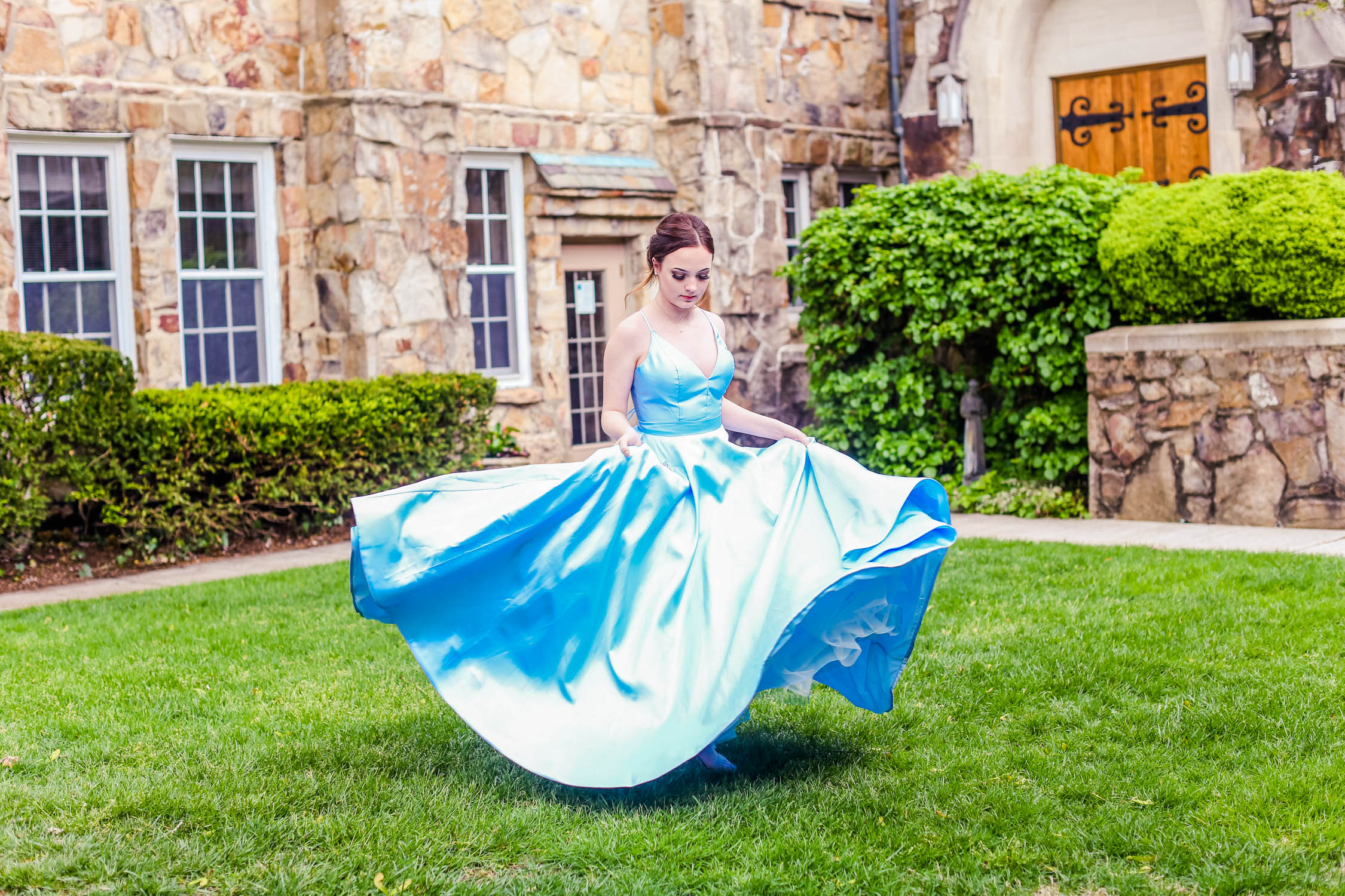 Girl posing for portraits before prom in Lookout Mountain, Georgia at a beautiful church