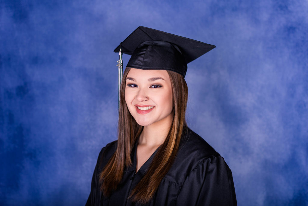 Cap and gown portrait with studio lighting