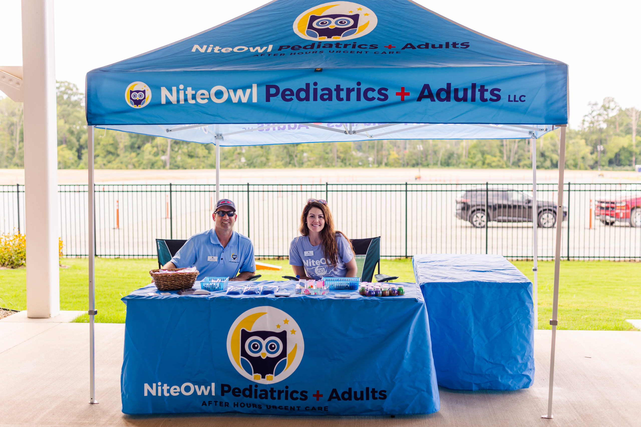 Night Owl Pediatrics booth at Soccer Shots Chattanooga hosts Family Night 2022 at CHI Memorial Stadium, home of the Red Wolves