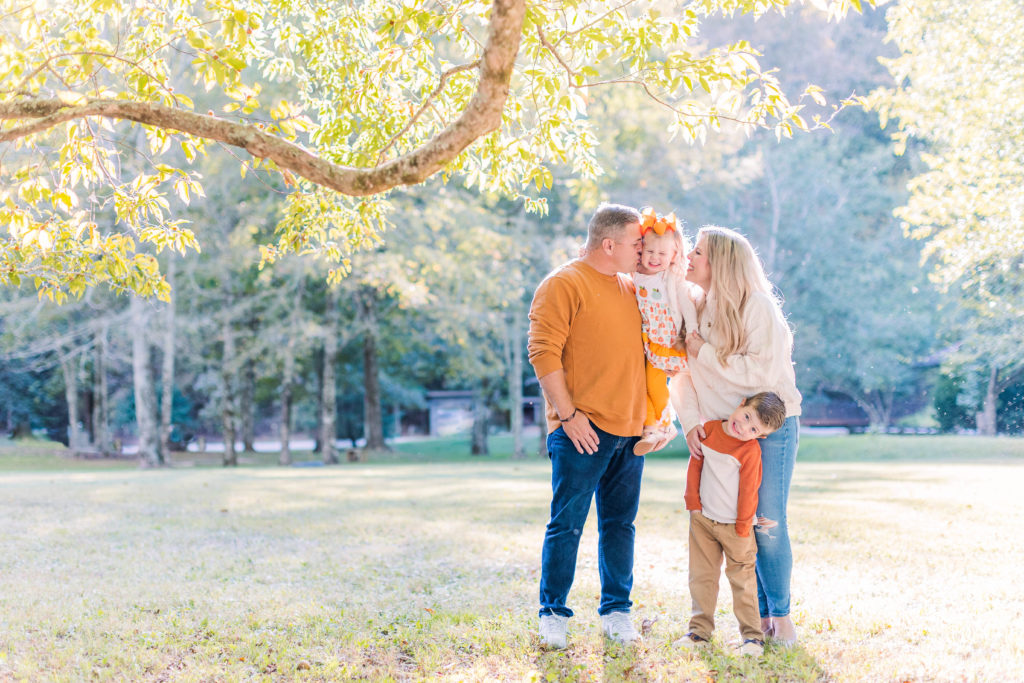Sweet family shares some smiles during Chattanooga Farm Mini Sessions in Hixson, Tennessee with Elle Bea Photography