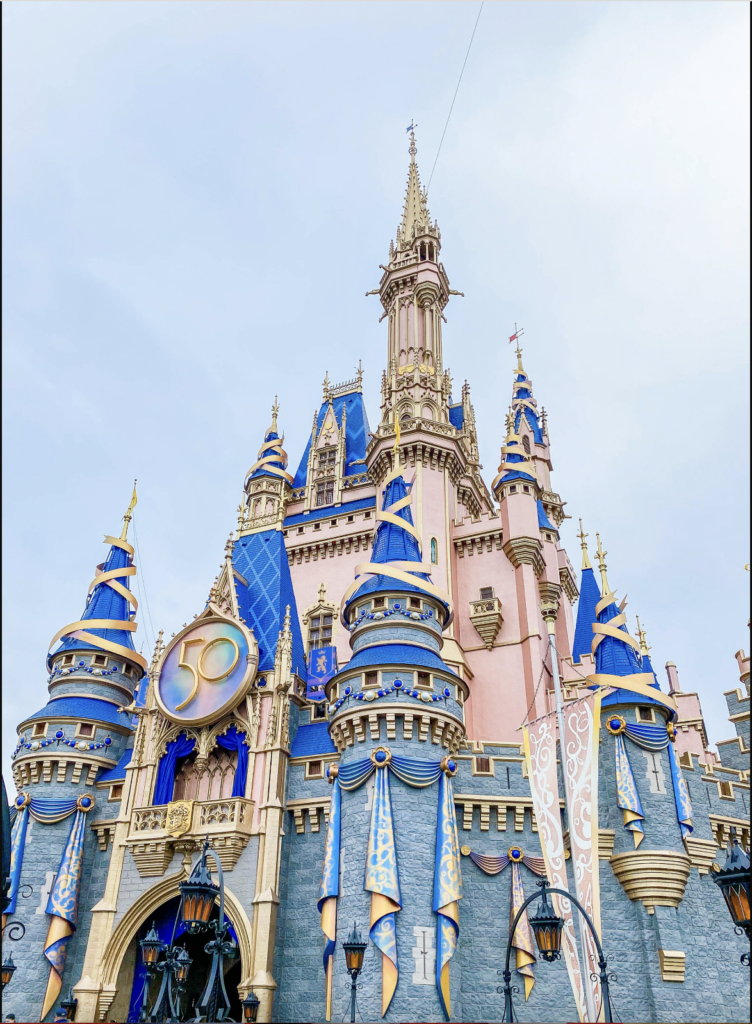 Cinderella Castle at Walt Disney World, decorated for the 50th anniversary celebration in 2022 and 2023