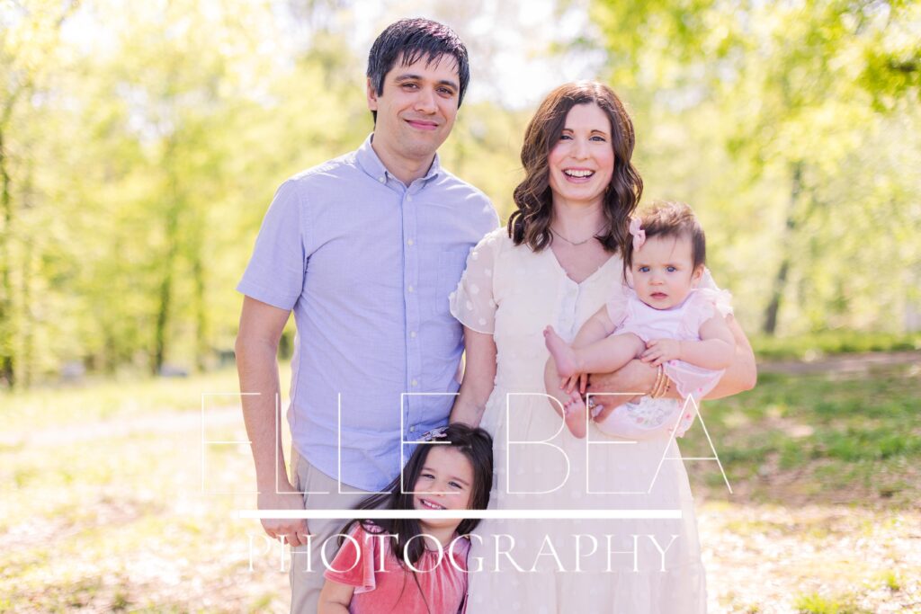 Family smiles for the camera looking perfecrly styled for their family mini session in Chickamauga, Georgia
